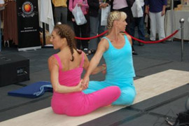 Fiona and Kate dynamic partner yoga class conference